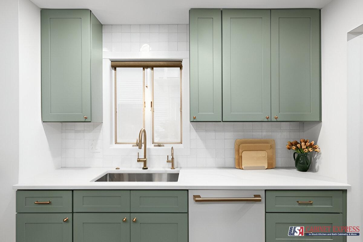 a kitchen with green cabinets and white countertops