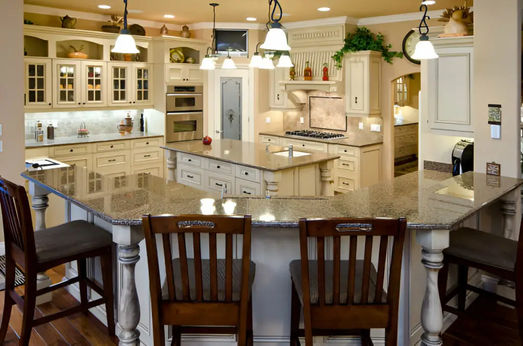 25 Kitchen Island Ideas for Every Space kitchen island ideas kitchen island ideas,kitchen island idea,kitchen island,island idea,kitchen,island,space,design,idea,room,countertop,storage,table,food,style,family,way,layout,dining,dining table,wood,look,stool,home,bar,work,place,tile,material,seating,element,area,sink,counter,side,small kitchen,light,cabinet,meal,kitchen island design,island great,floor,kitchen island great,island seating,drawer,island design,person,function,wall,lot