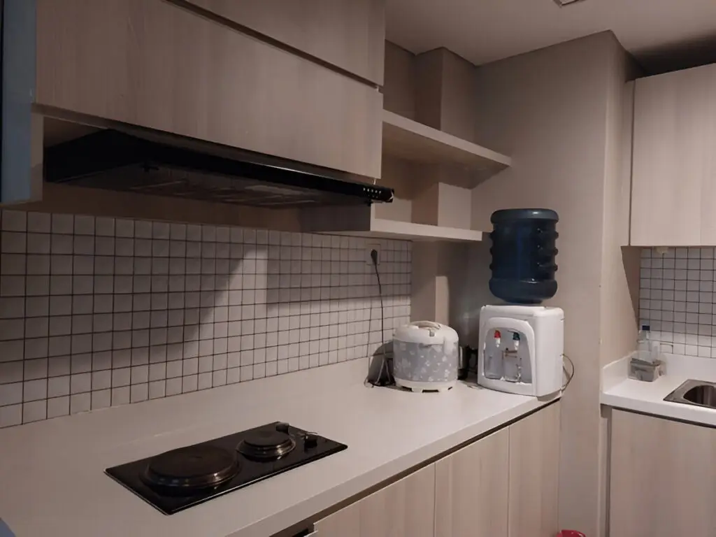 10 Eco-Friendly Kitchen Cabinet Storage Ideas for a Greener Home 8 Small kitchen with wooden cabinets and countertop appliances
