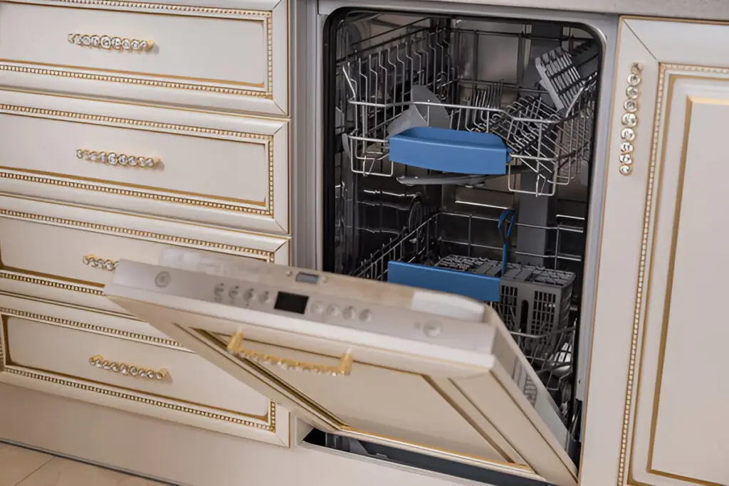 Hidden Kitchen Cabinet Storage Ideas You Need to Try 6 Opened dishwasher with decorative front panel integrated into luxury kitchen cabinets.